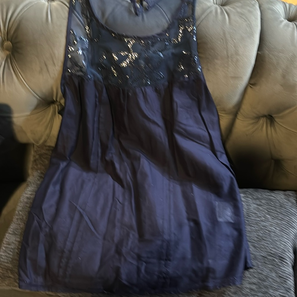 Delicate navy top with sequins accents 100%cotton